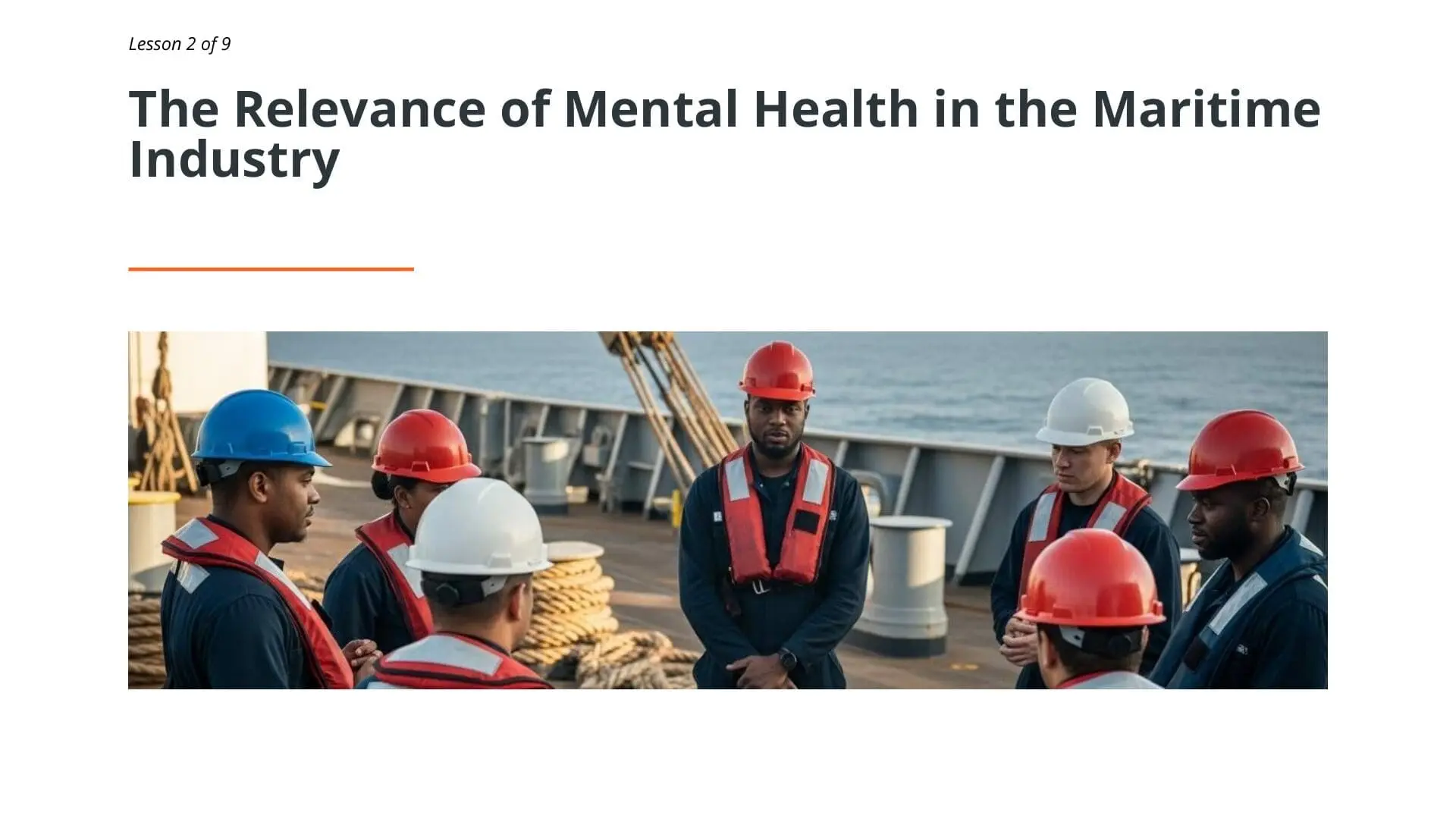 Diverse maritime crew members wearing safety helmets gathered on ship deck discussing mental health awareness and workplace wellbeing in seafaring industry.