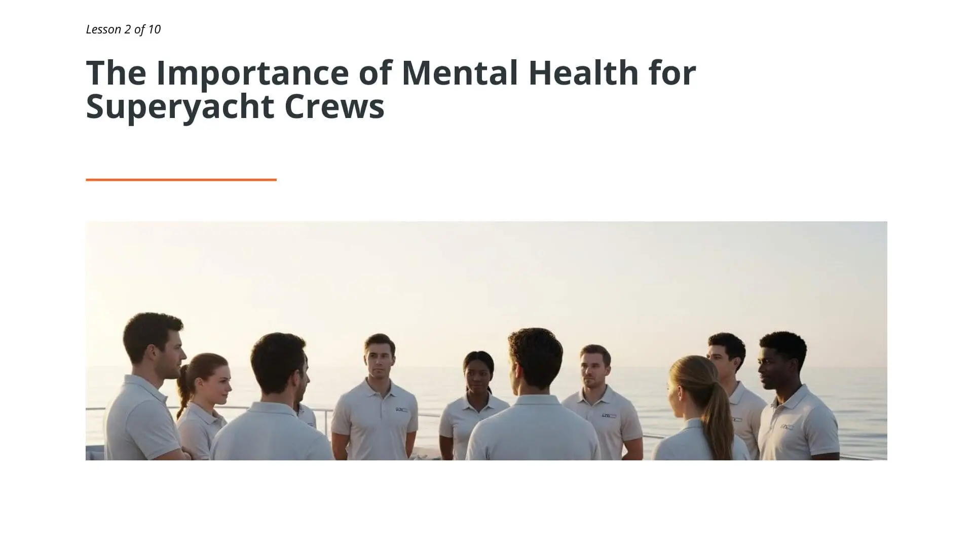 Diverse superyacht crew members gathered on deck discussing mental health awareness and resilience training as part of STCW online maritime safety certification course