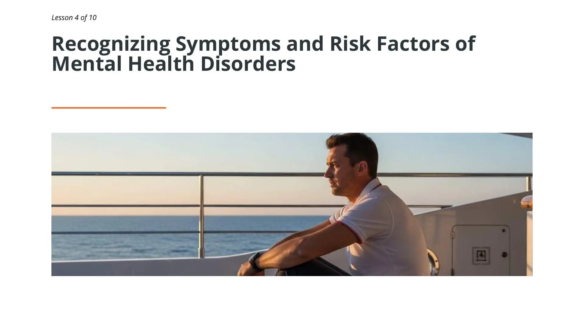 Superyacht crew member in white shirt leaning on railing overlooking ocean, representing mental health awareness and wellbeing in maritime profession