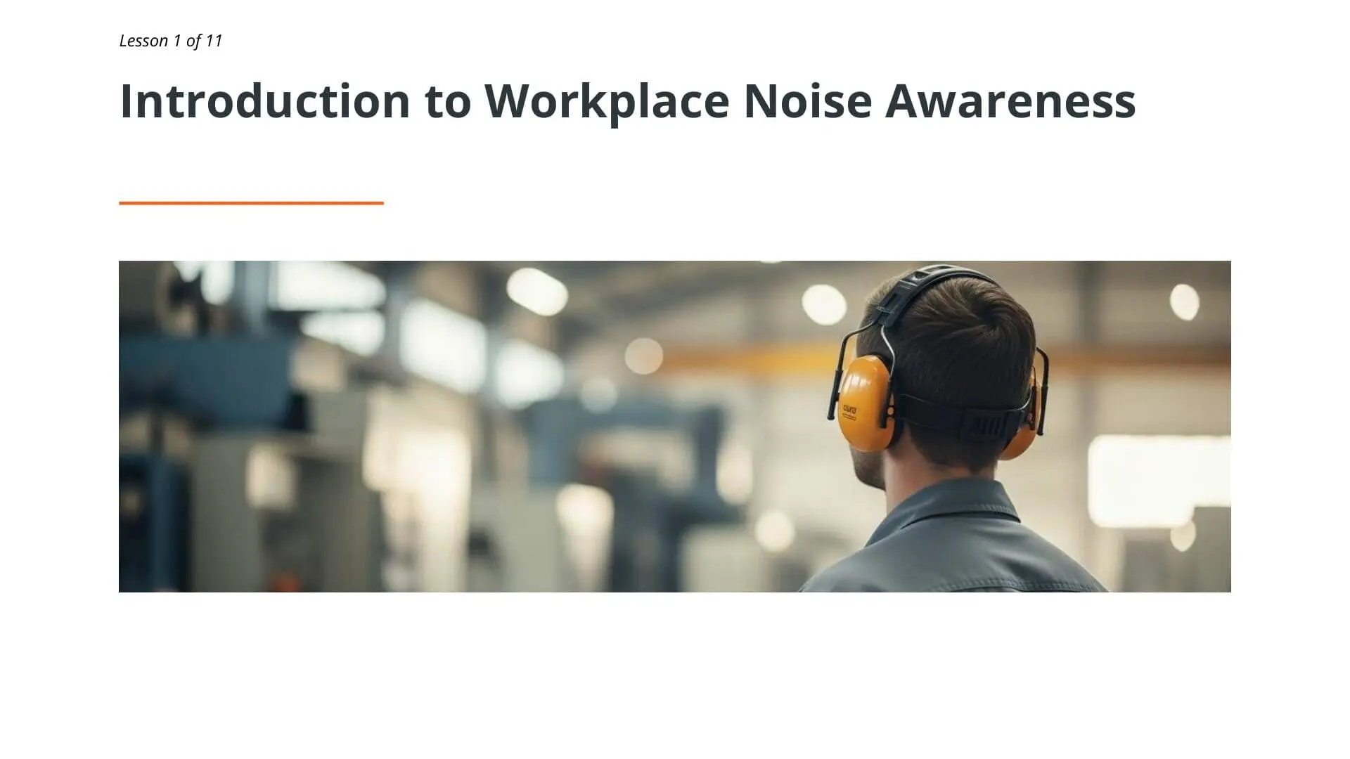 Industrial worker wearing yellow ear defenders in factory setting, demonstrating workplace noise safety and hearing protection awareness training
