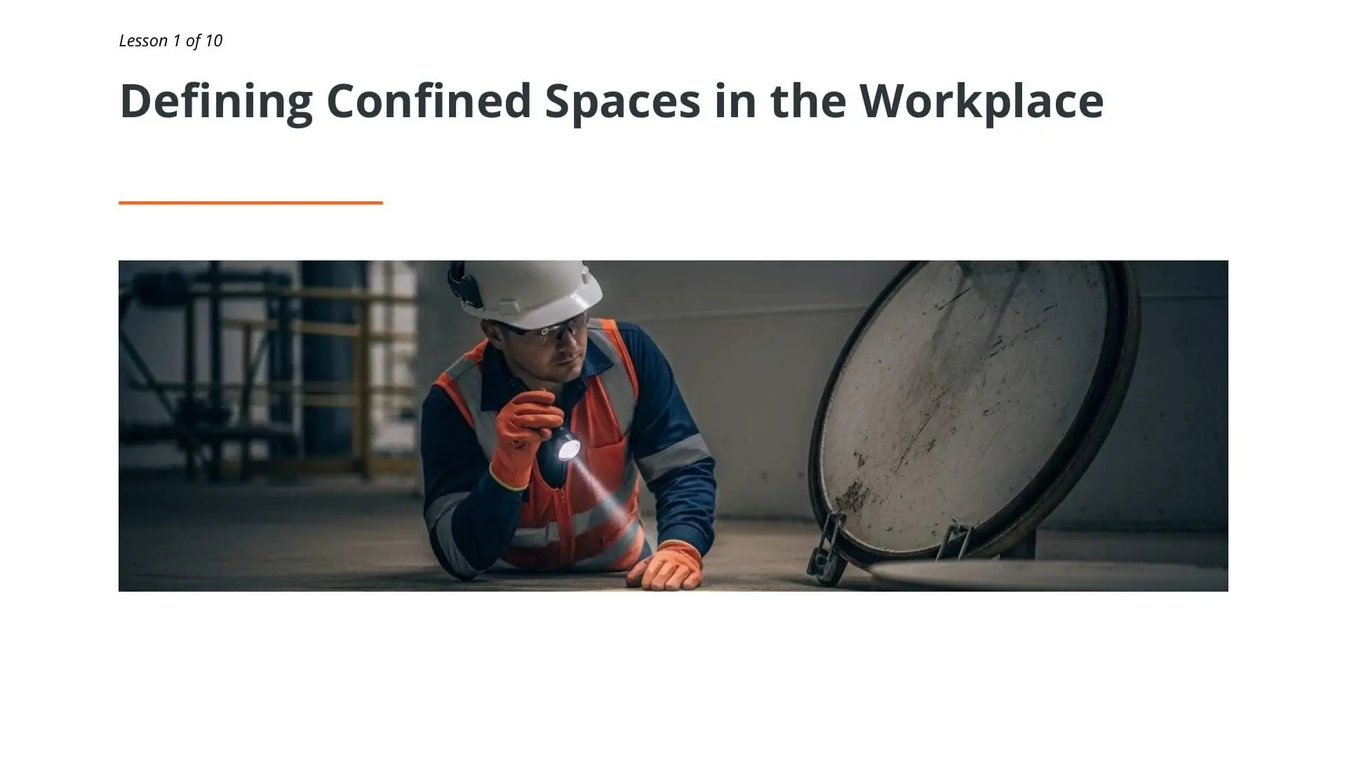 Safety inspector with hard hat and flashlight examining large industrial pipe in confined space environment