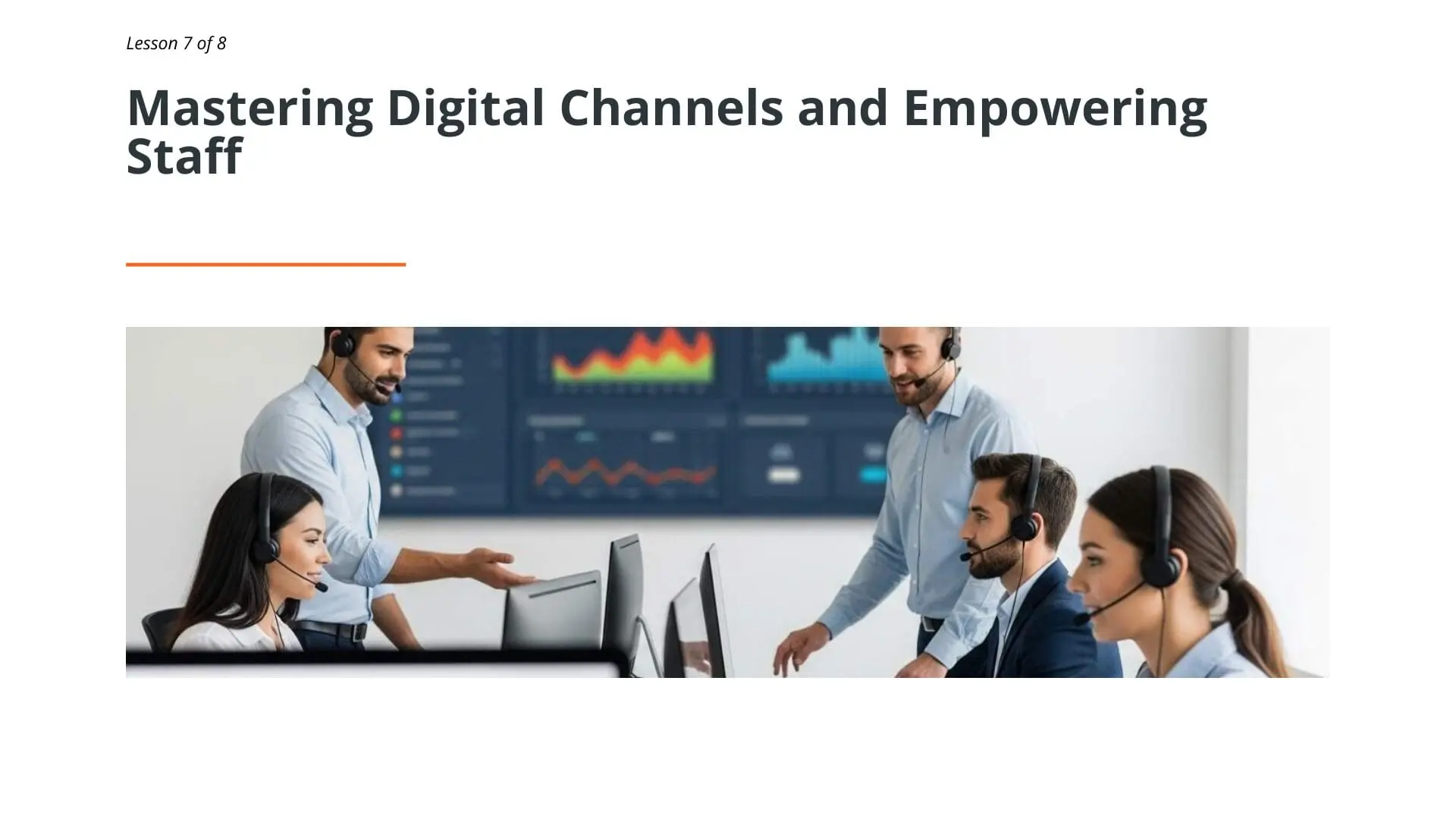 Team of customer service professionals with headsets monitoring digital analytics dashboards in modern training environment