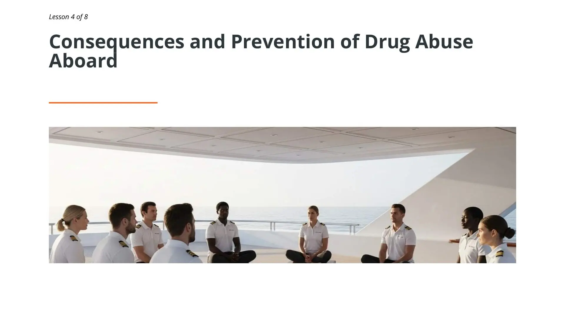 Diverse superyacht crew members in white uniforms sitting together during drug abuse awareness training session on a luxury yacht