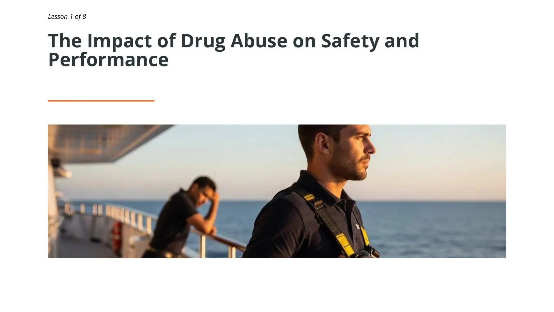 Professional crew member in safety harness on superyacht deck overlooking ocean, representing drug abuse awareness training for maritime safety