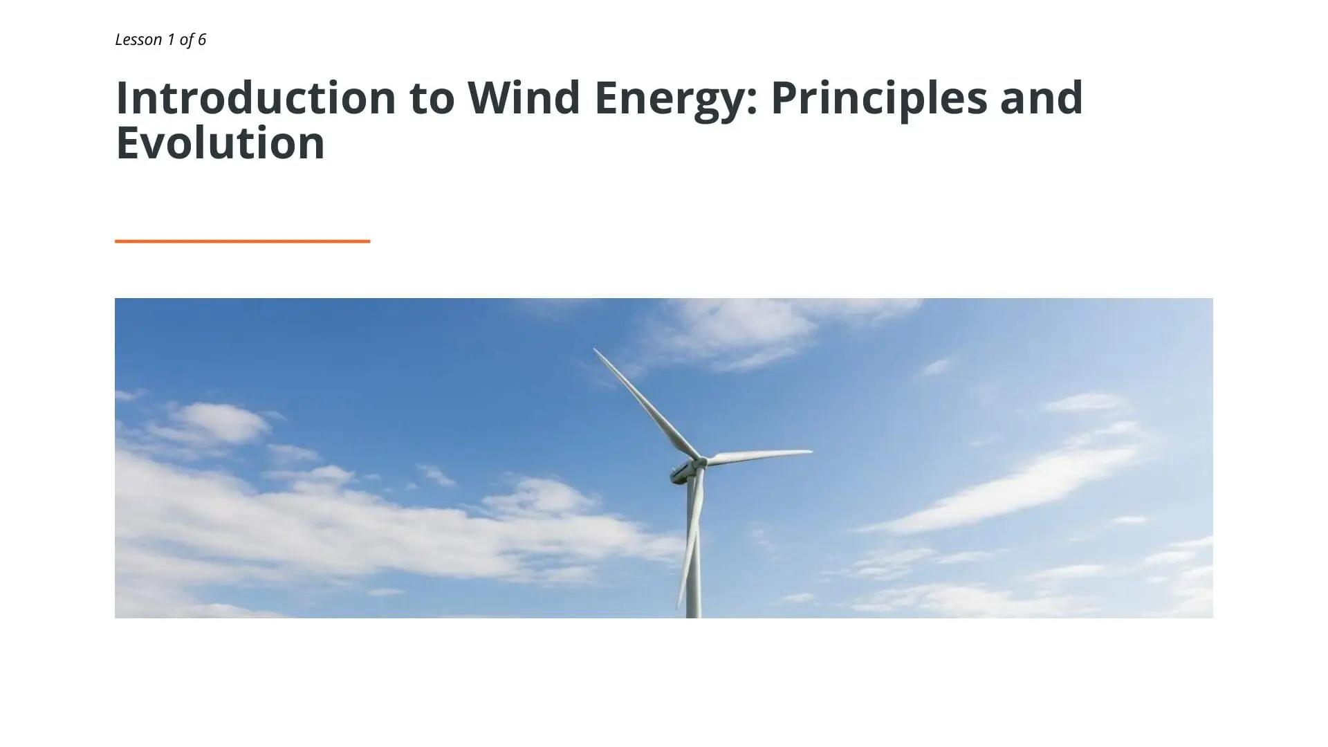 Modern wind turbine against blue sky with clouds, illustrating offshore wind energy fundamentals for industrial training