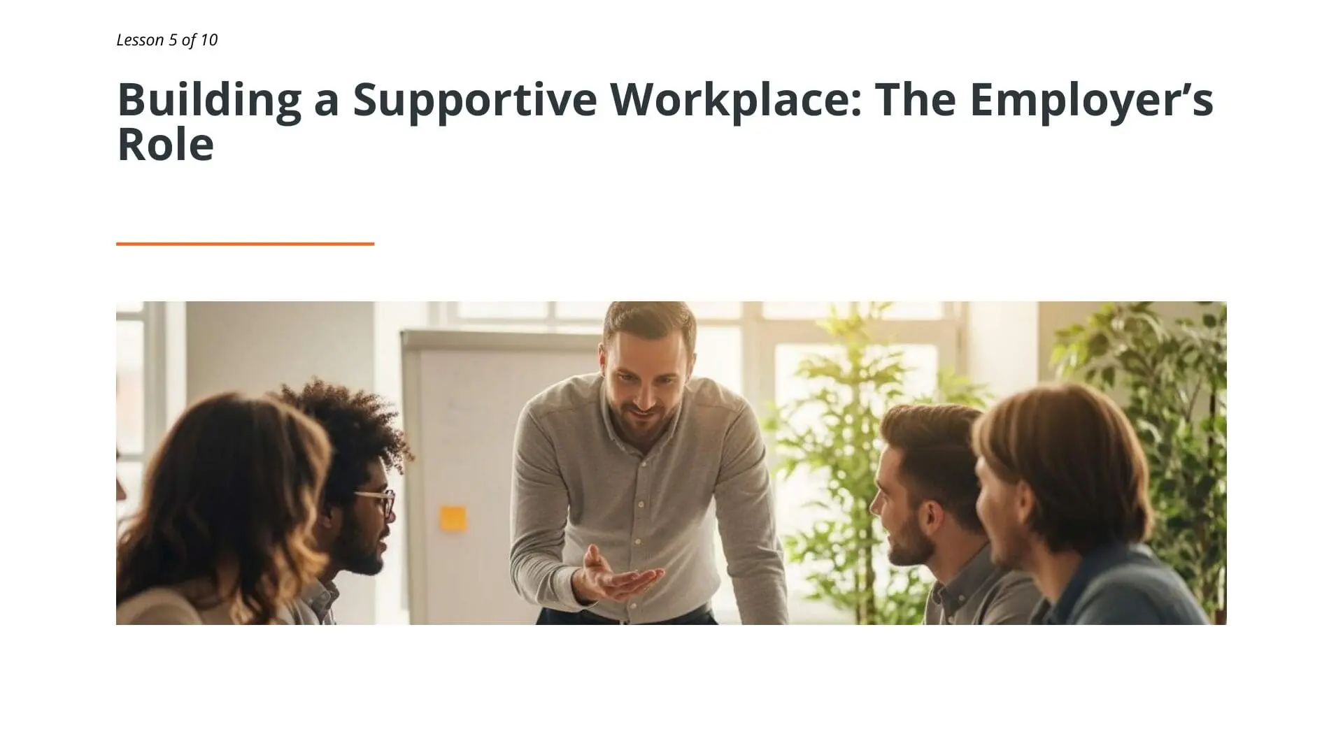 Manager discussing workplace stress awareness and resilience with diverse team members in bright office environment with plants