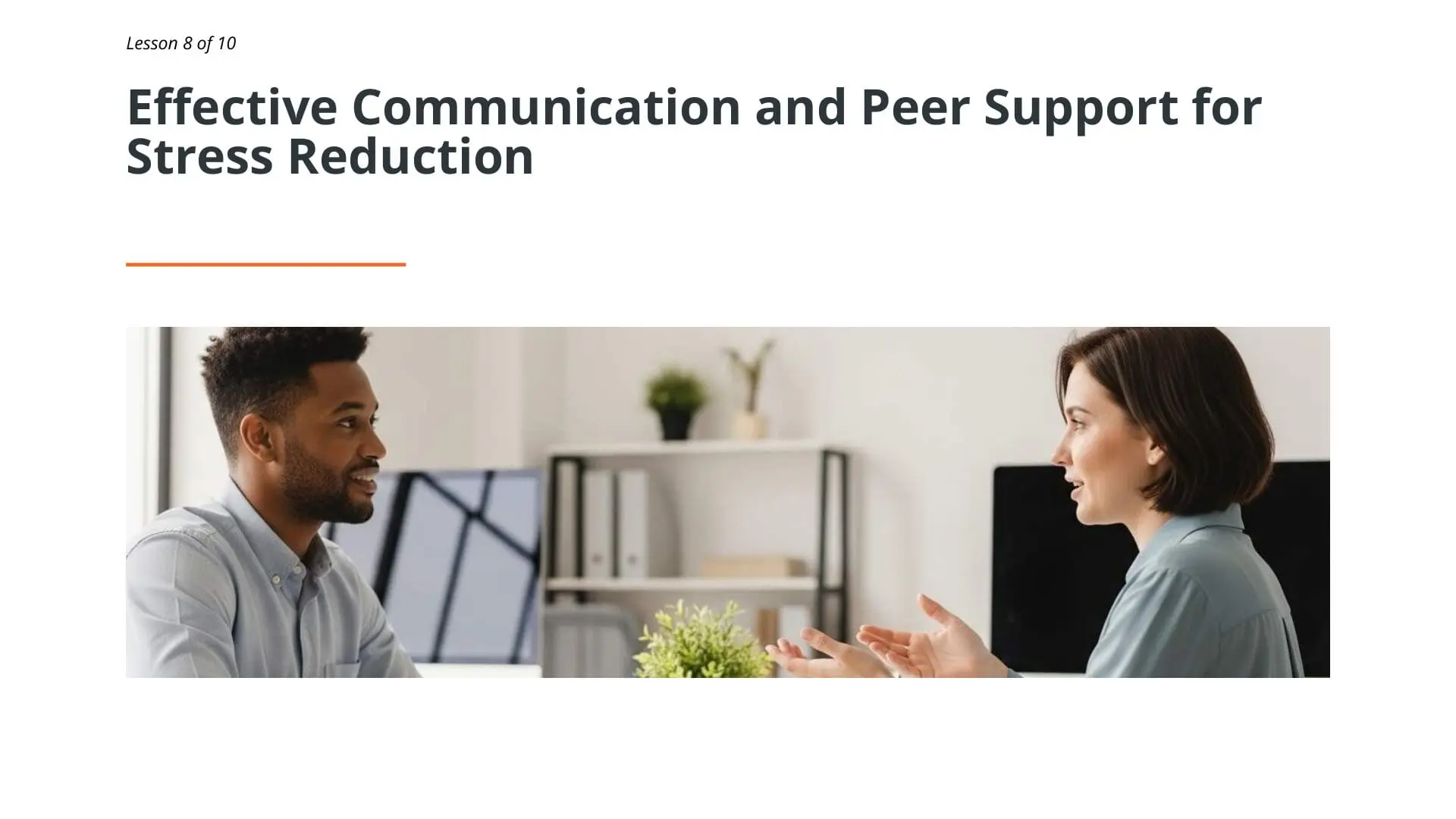 Two colleagues engaging in supportive conversation at workplace, demonstrating effective communication and peer support techniques for stress management and resilience