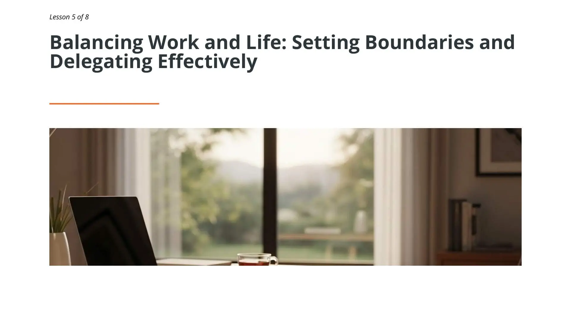 Home office workspace with laptop overlooking scenic landscape, representing work-life balance and effective time management for maritime professionals