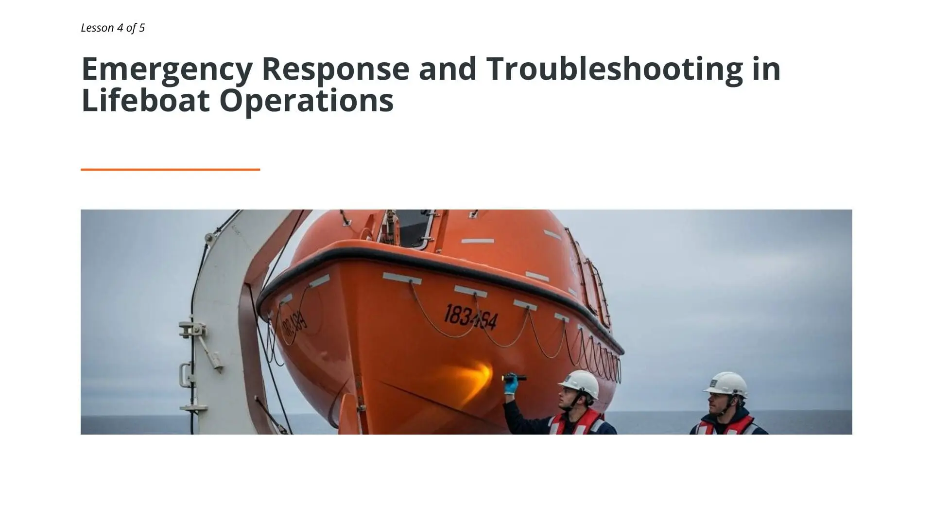 Maritime crew members in safety helmets inspecting orange free-fall lifeboat during emergency response training for STCW lifeboat operations certification