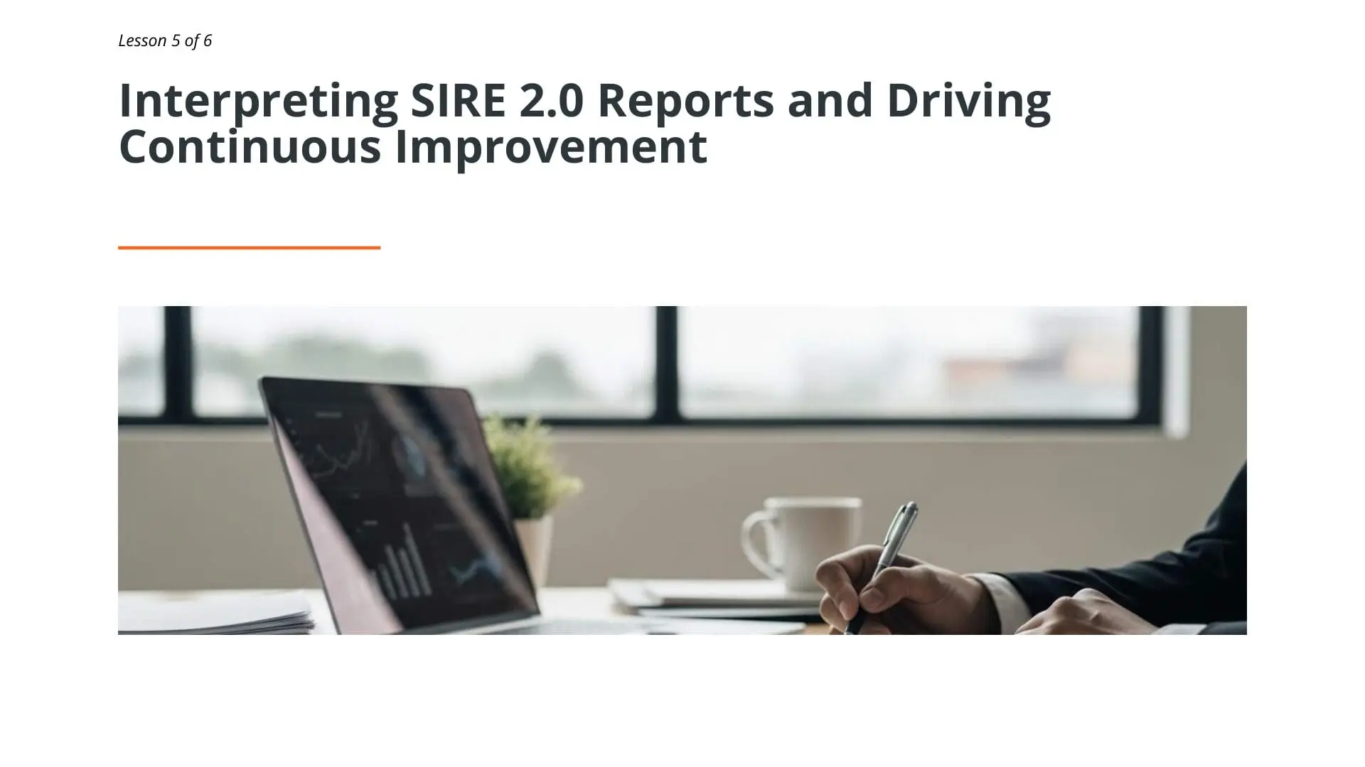 Professional at desk reviewing SIRE 2.0 reports on laptop for tanker vessel inspection compliance and continuous improvement
