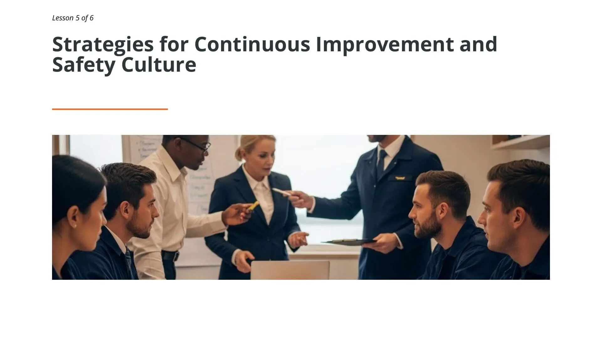 Maritime professionals in uniform discuss continuous improvement and safety culture strategies during a training session for RightShip dry bulk vetting preparation.