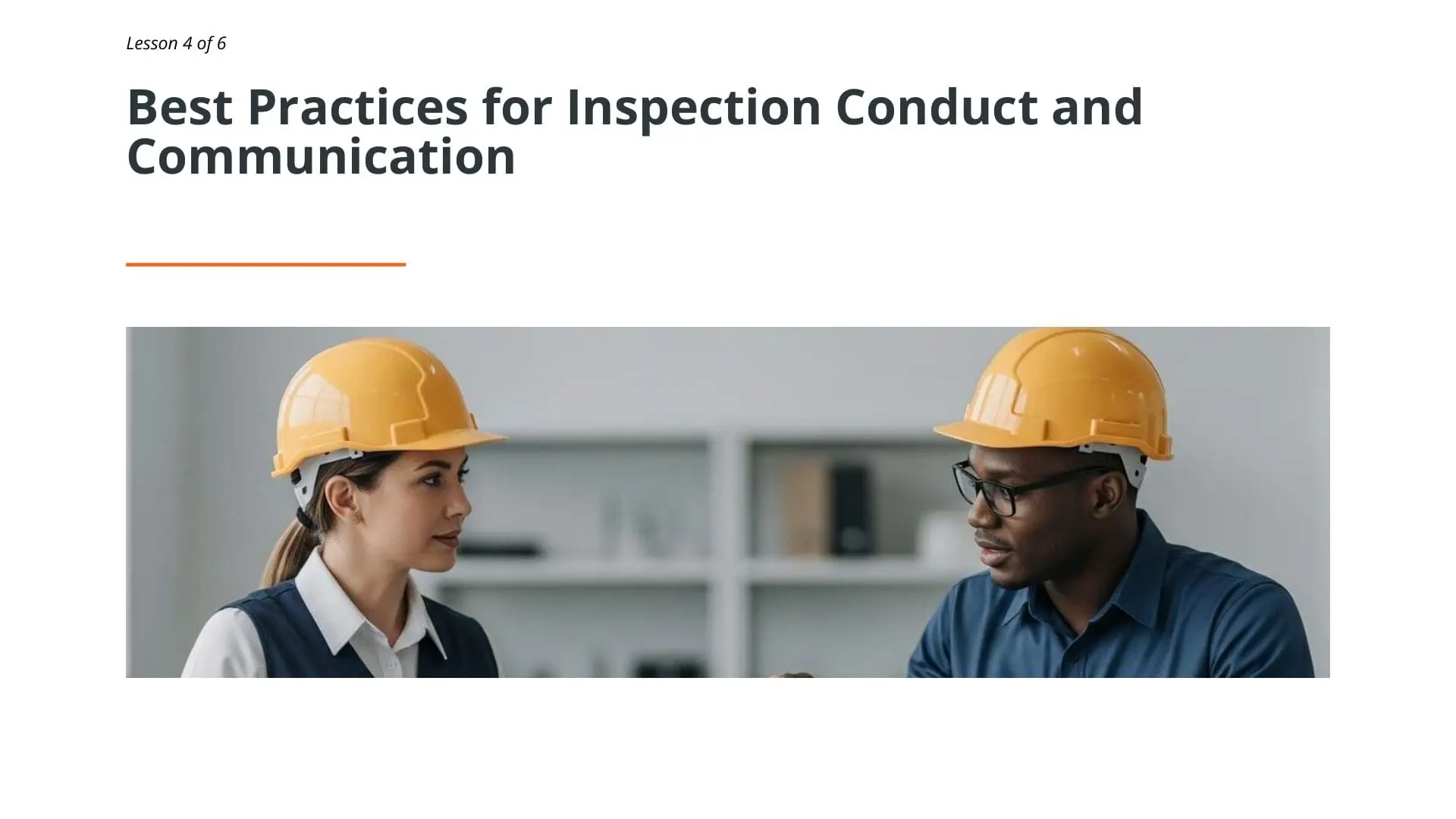 Two maritime professionals wearing hard hats discussing inspection procedures in an industrial setting, representing best practices for RightShip dry bulk vetting inspections