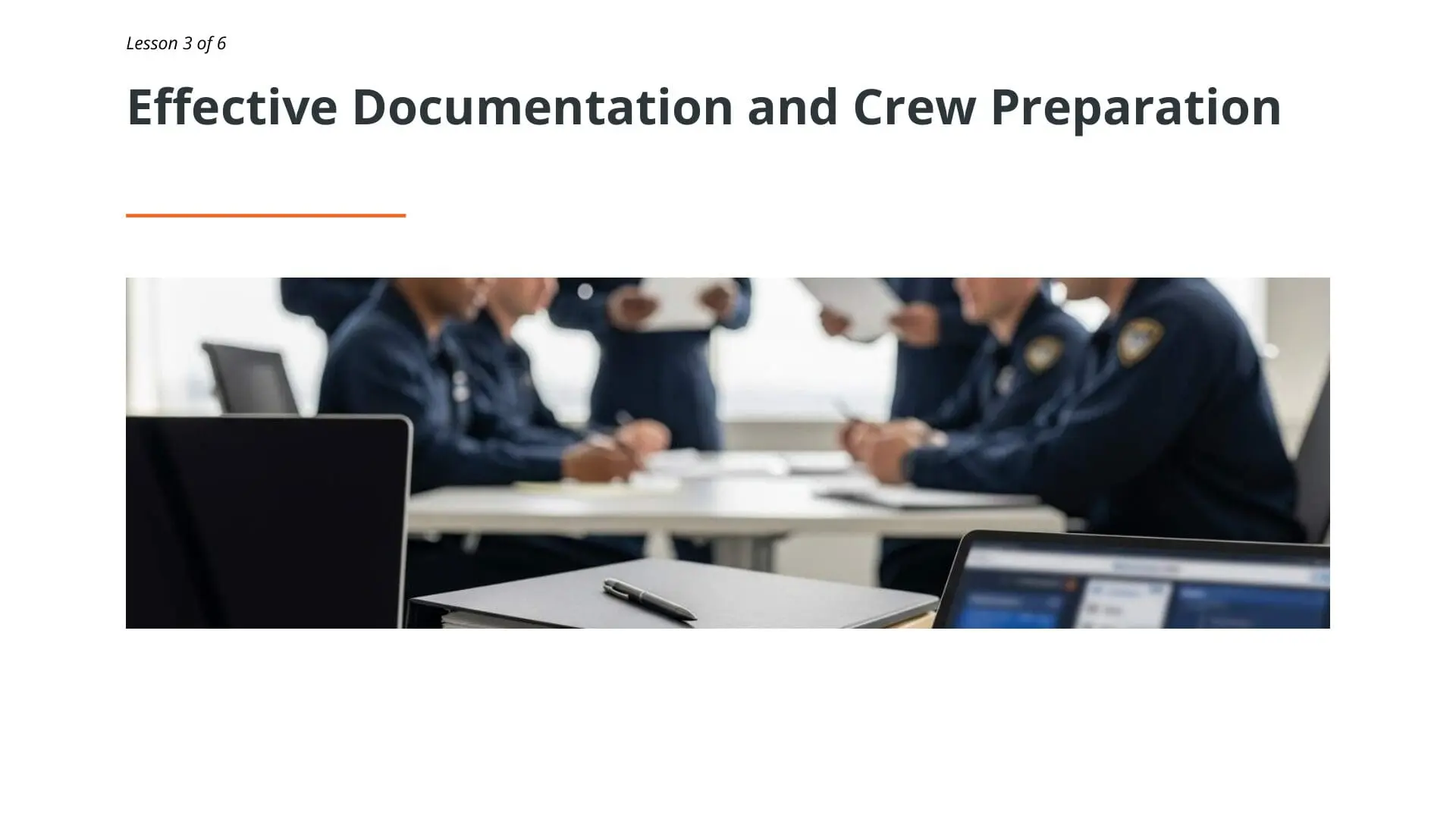 Maritime professionals in uniforms reviewing documents during crew preparation meeting for RightShip vetting inspection training