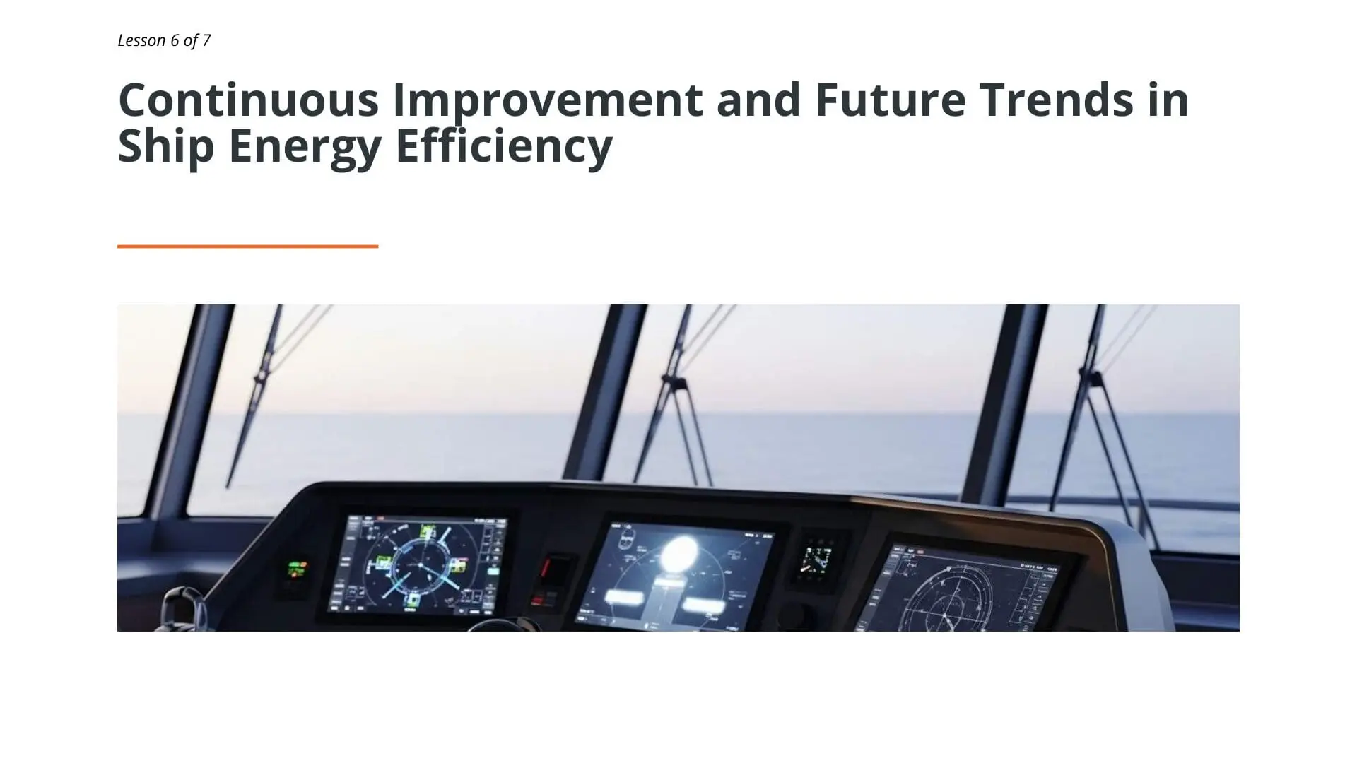 Modern ship bridge display screens showing navigation and energy efficiency monitoring systems for STCW maritime training