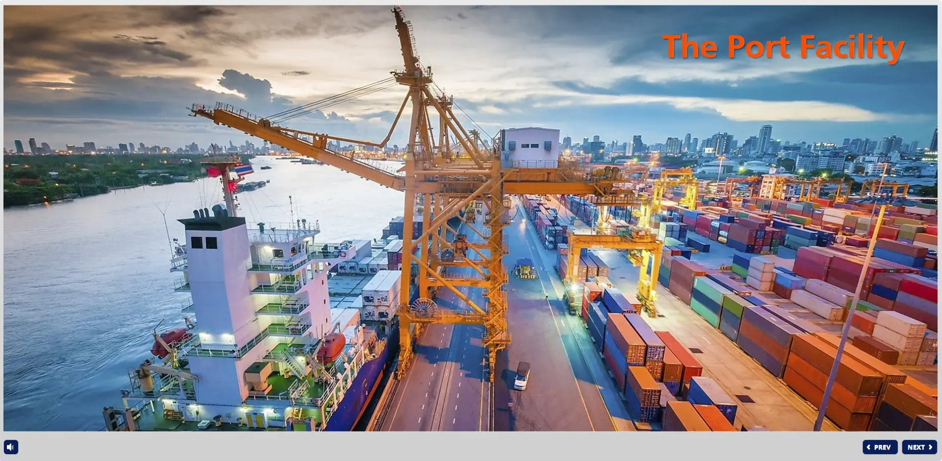 Cargo ship loading containers at busy port facility with yellow cranes, stacked shipping containers, and city skyline in background during dusk